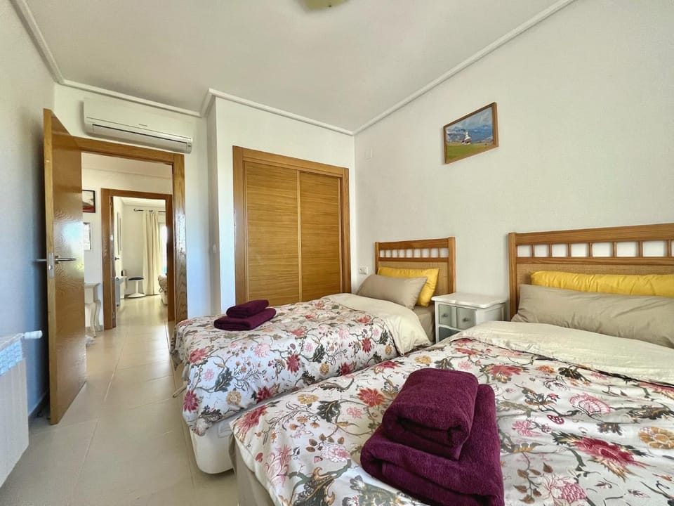Bed, Bedroom, towels, wardrobe, air conditioner