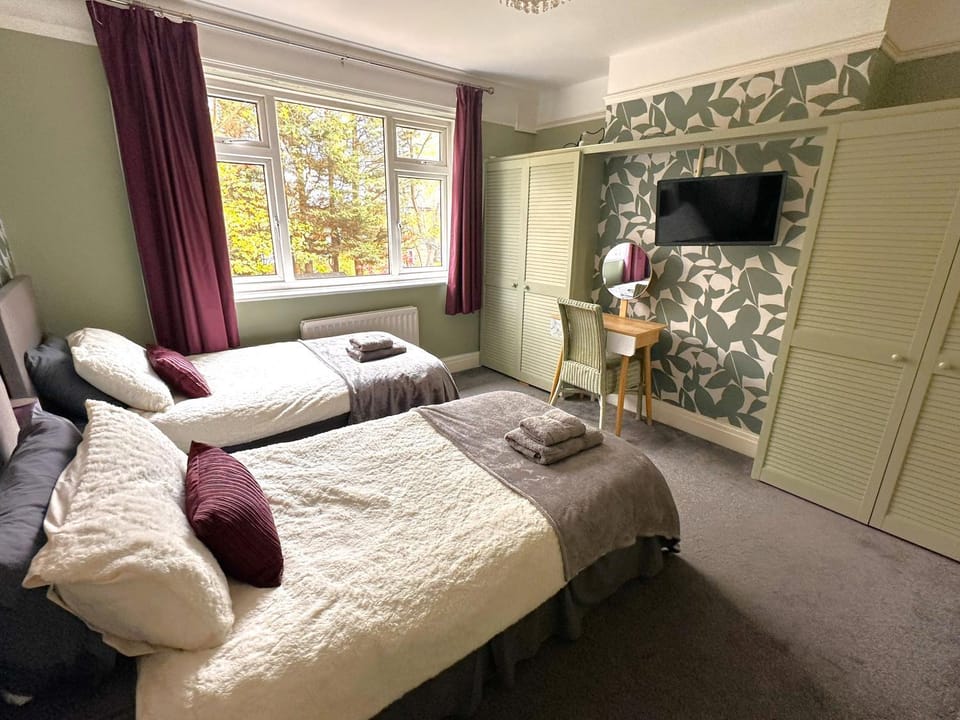 Bed, TV and multimedia, Bedroom, hair dryier, towels, wardrobe