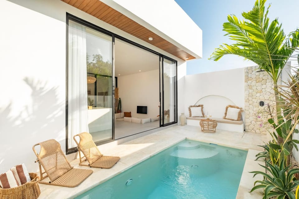 Property building, Patio, Day, Natural landscape, Seating area, Pool view, Swimming pool, sunbed