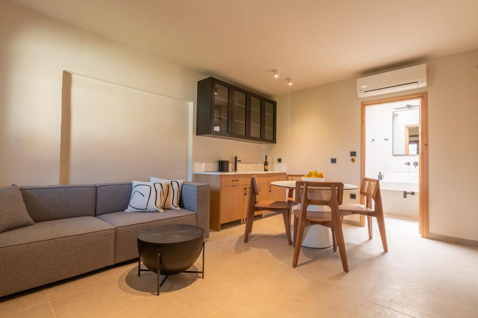 Kitchen or kitchenette, Living room, Seating area, Dining area