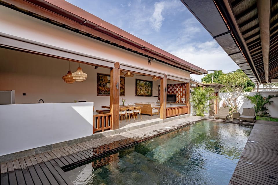 Property building, Patio, Pool view, Swimming pool, sunbed