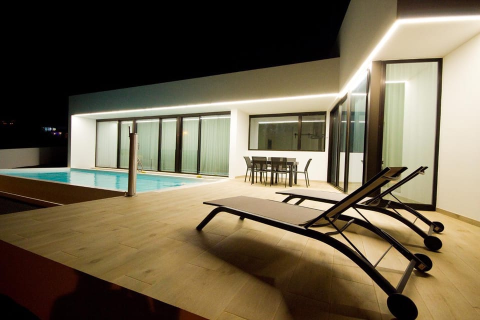 Night, Pool view, Swimming pool, sunbed
