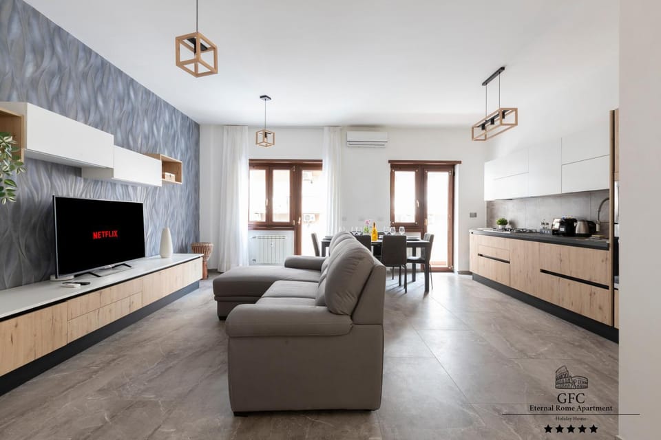 TV and multimedia, Kitchen or kitchenette, Living room, Seating area, Dining area, stove, air conditioner