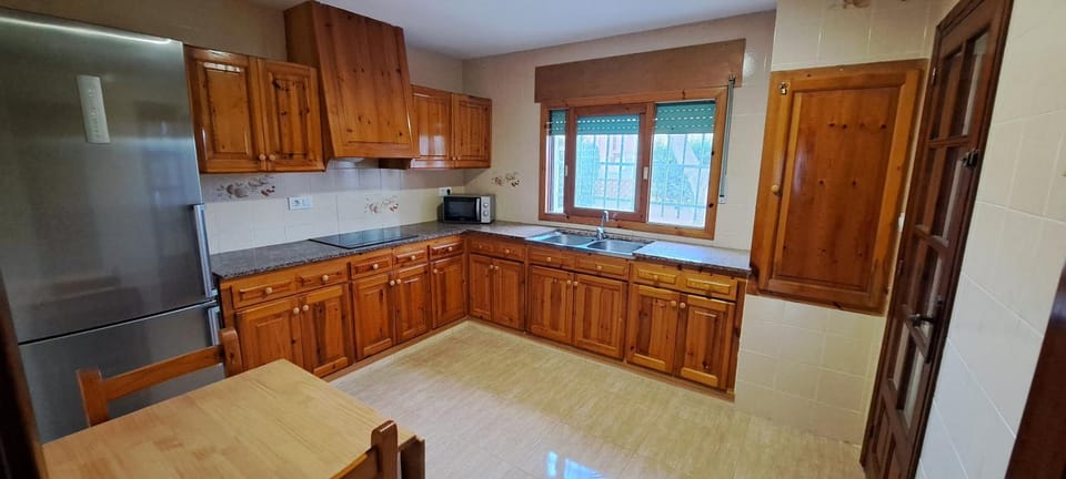 Kitchen or kitchenette, microwave, stove