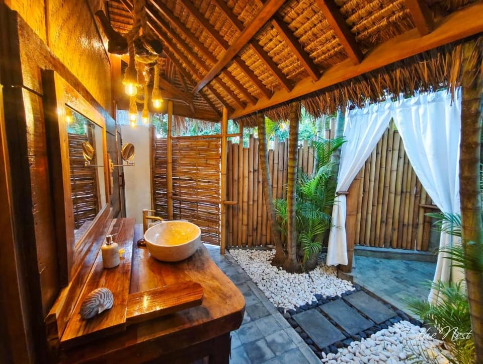 Toilet, Natural landscape, Bathroom, Decorative detail, hair dryier, towels