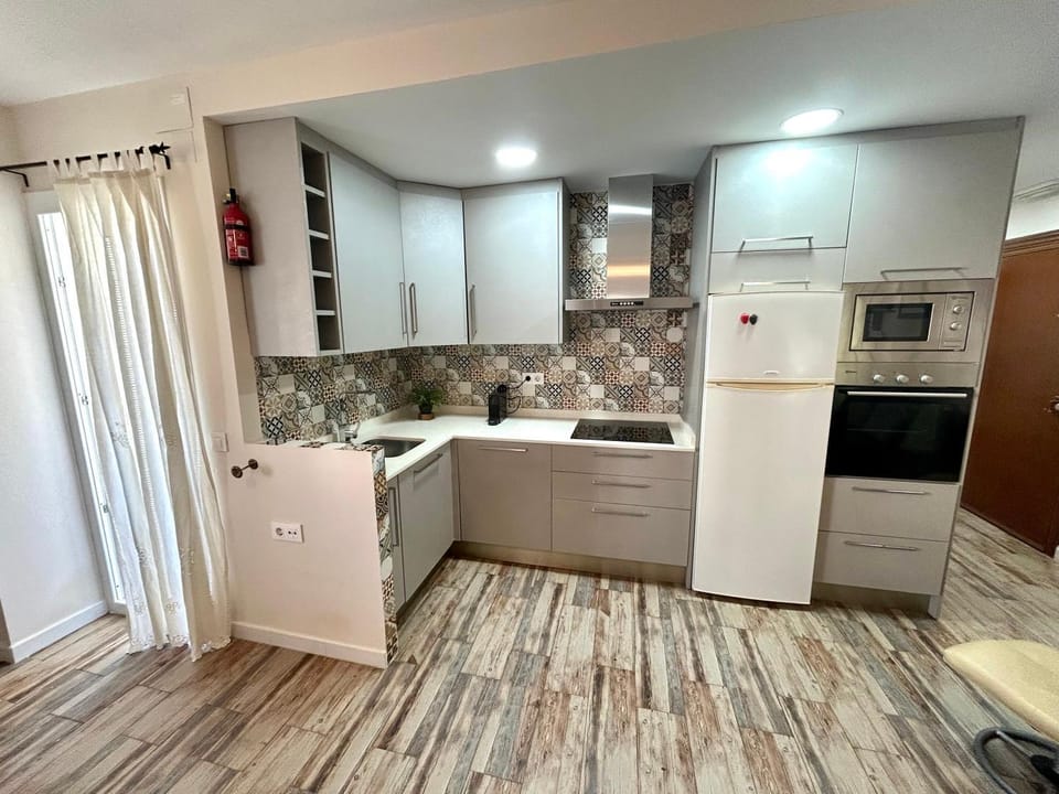 Kitchen or kitchenette, oven, stove