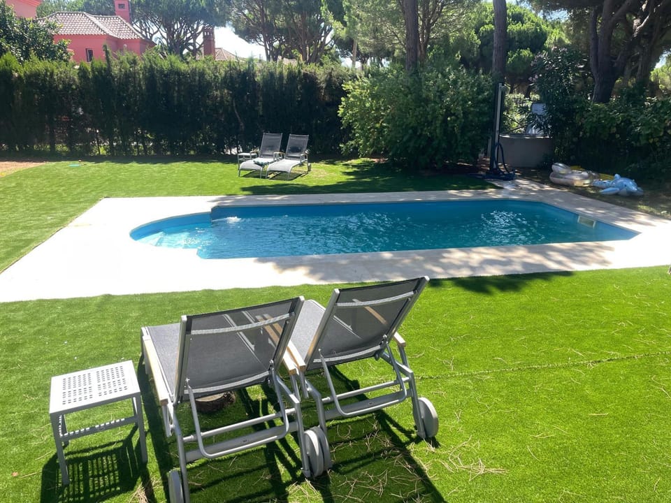 Property building, Living room, Swimming pool