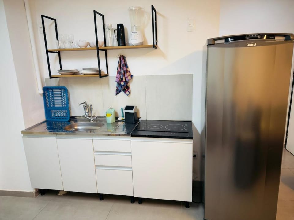 07 - ESTÚDIO ESPAÇOSO com Área privativa, Vaga de garagem, Cozinha montada, vizinho ao Life Center Apartment in Belo Horizonte