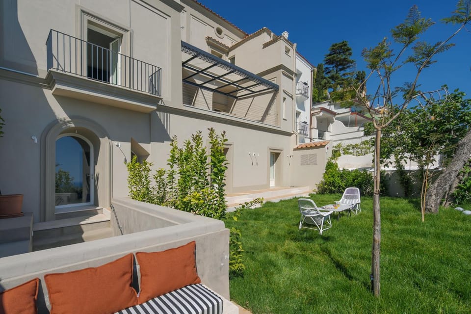 Facade/entrance, Garden, Mountain view, Sea view, Sunset