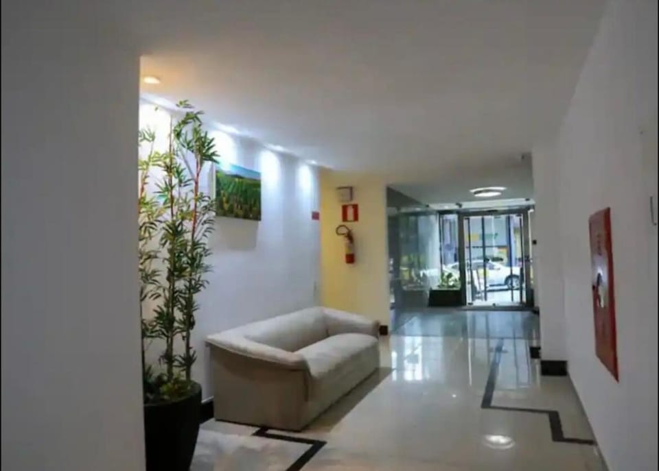 12 - ESTÚDIO CHARMOSO, Ar condicionado, Cozinha completa, Vaga de garagem Apartment in Belo Horizonte