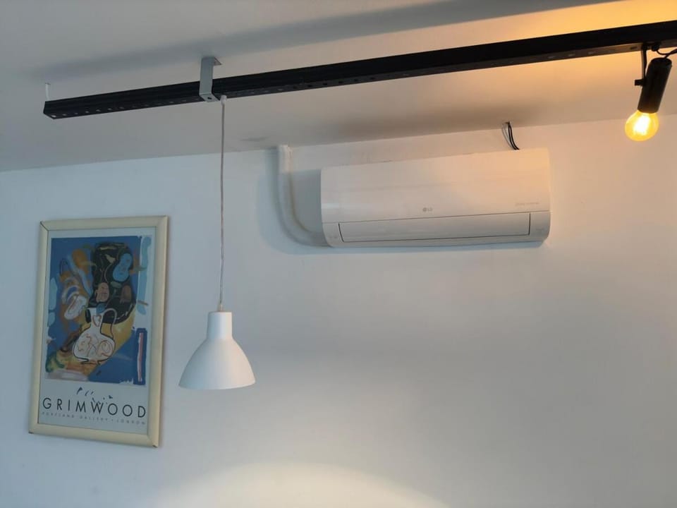 12 - ESTÚDIO CHARMOSO, Ar condicionado, Cozinha completa, Vaga de garagem Apartment in Belo Horizonte