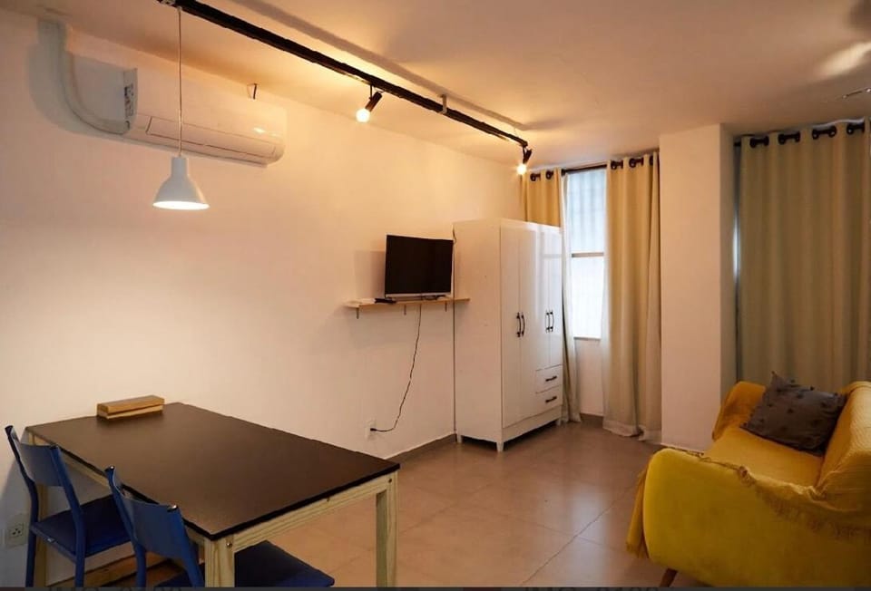 12 - ESTÚDIO CHARMOSO, Ar condicionado, Cozinha completa, Vaga de garagem Apartment in Belo Horizonte
