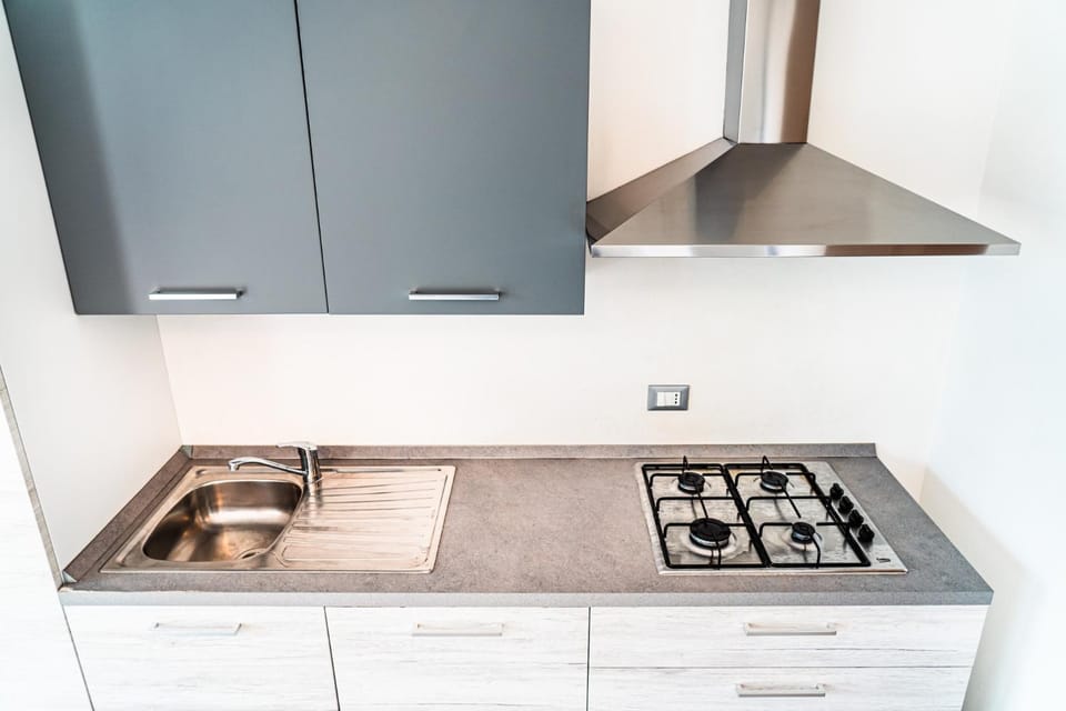 Kitchen or kitchenette, stove