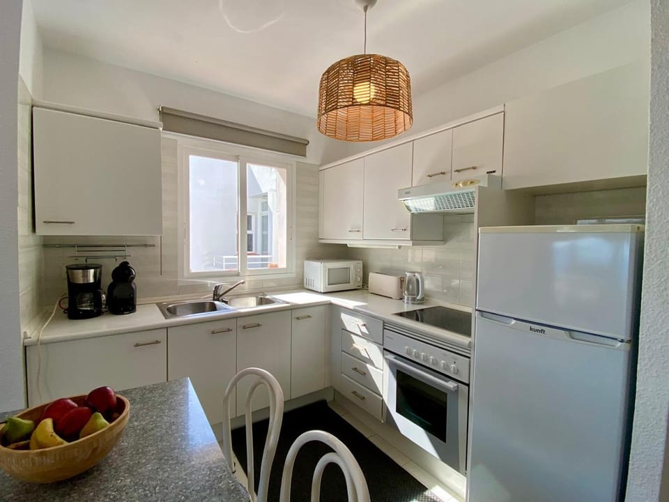 Kitchen or kitchenette, oven, stove, toaster