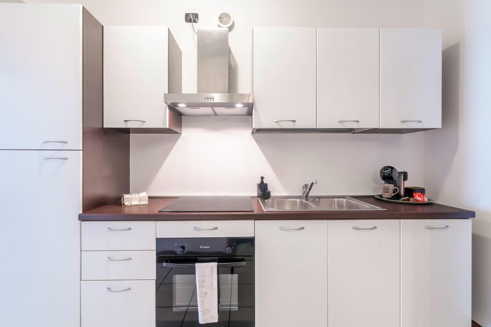 Kitchen or kitchenette, oven, stove
