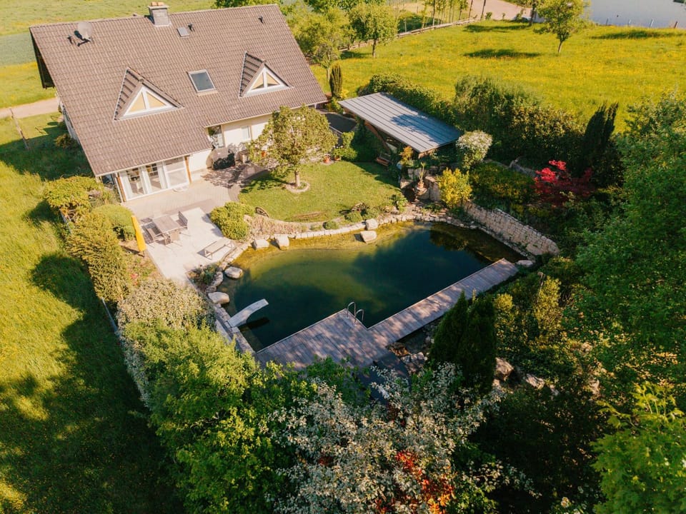 Property building, Natural landscape, Garden, Garden view, Pool view, Swimming pool