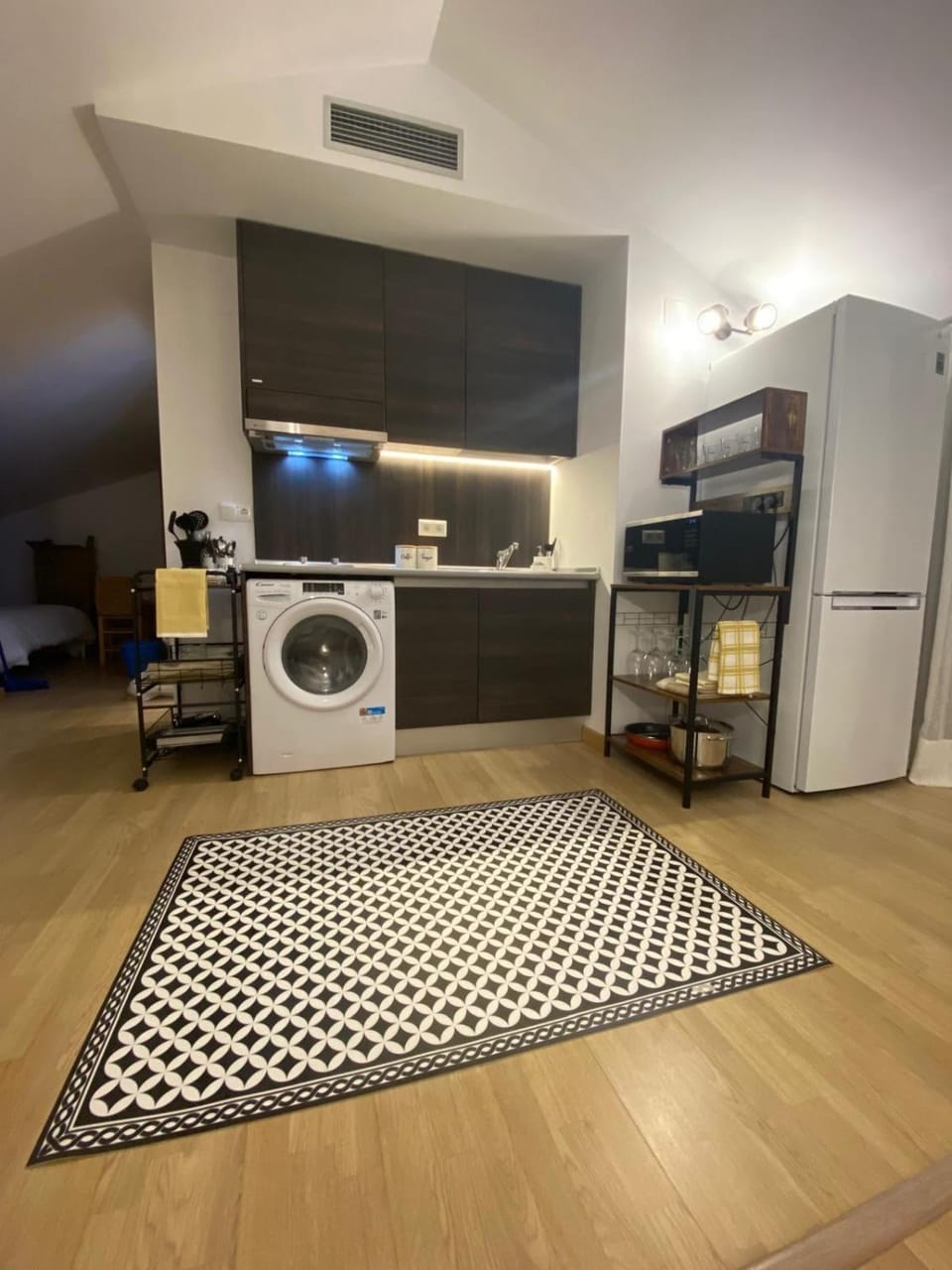 Kitchen or kitchenette, oven, stove, washing machine, dryer