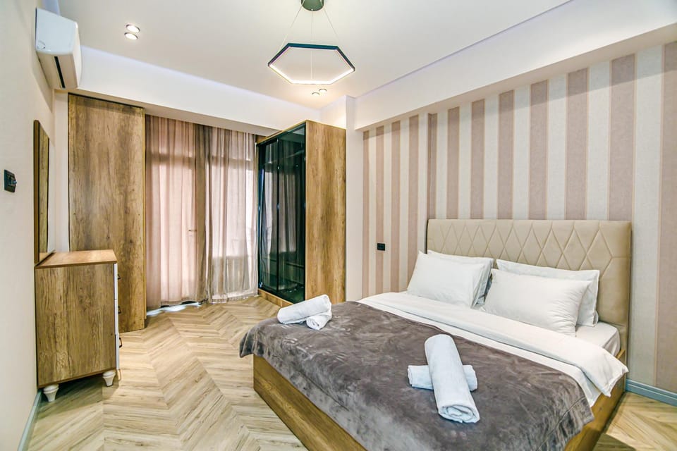 Bed, Photo of the whole room, Bedroom, towels, wardrobe