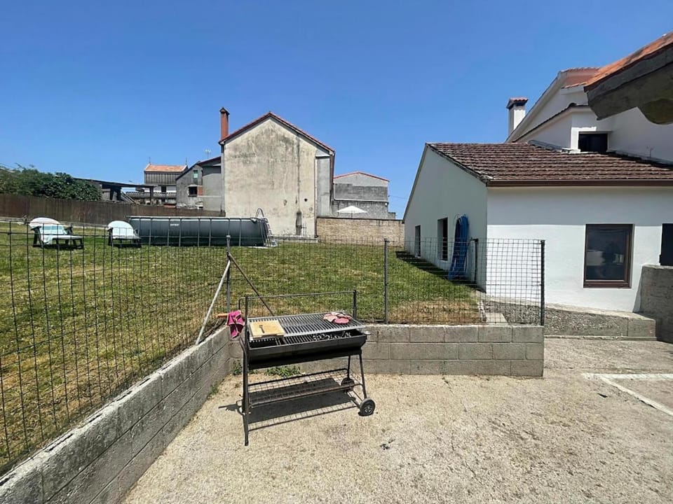 Property building, BBQ facilities, sunbed