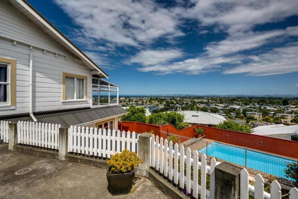 Property building, Day, View (from property/room), City view, Pool view, Swimming pool