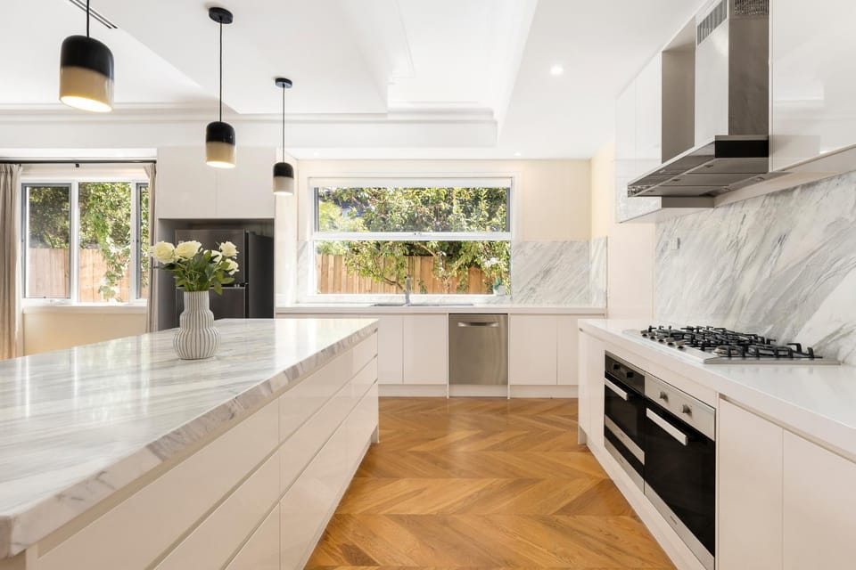 Kitchen or kitchenette, dishwasher, oven, stove