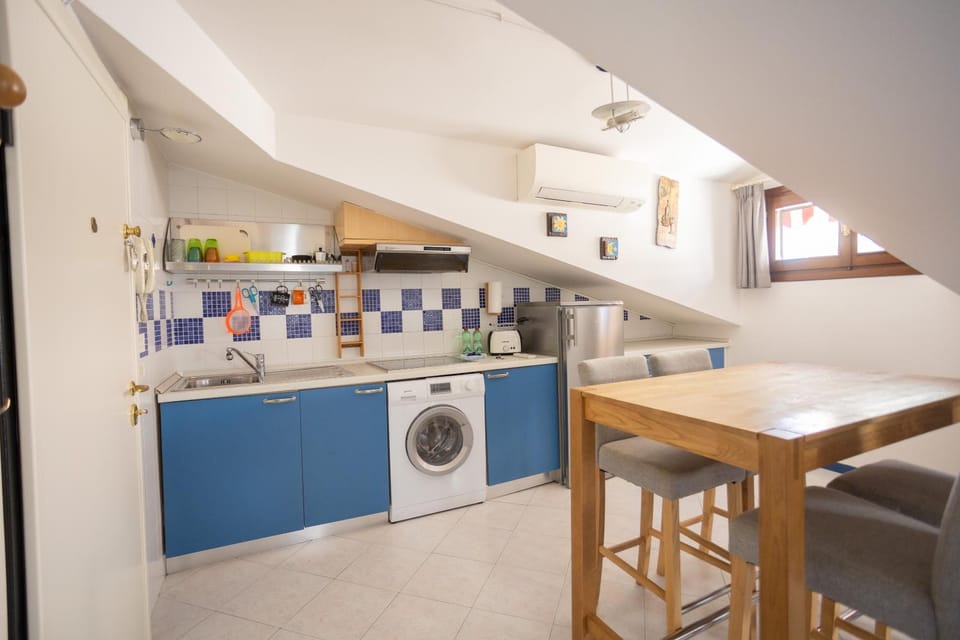 Kitchen or kitchenette, Living room, Dining area, stove, washing machine, dryer