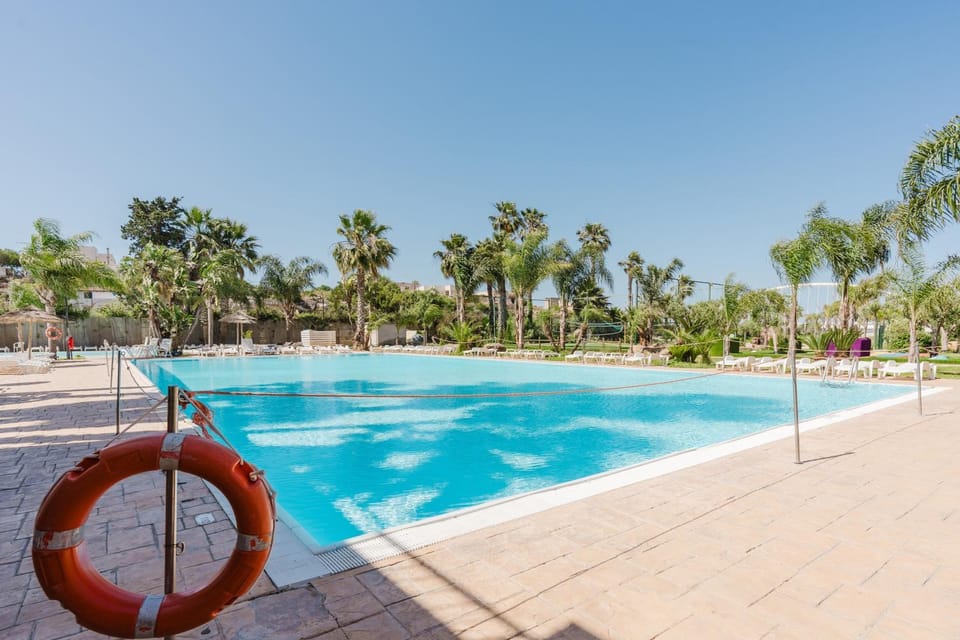 Property building, Living room, Swimming pool