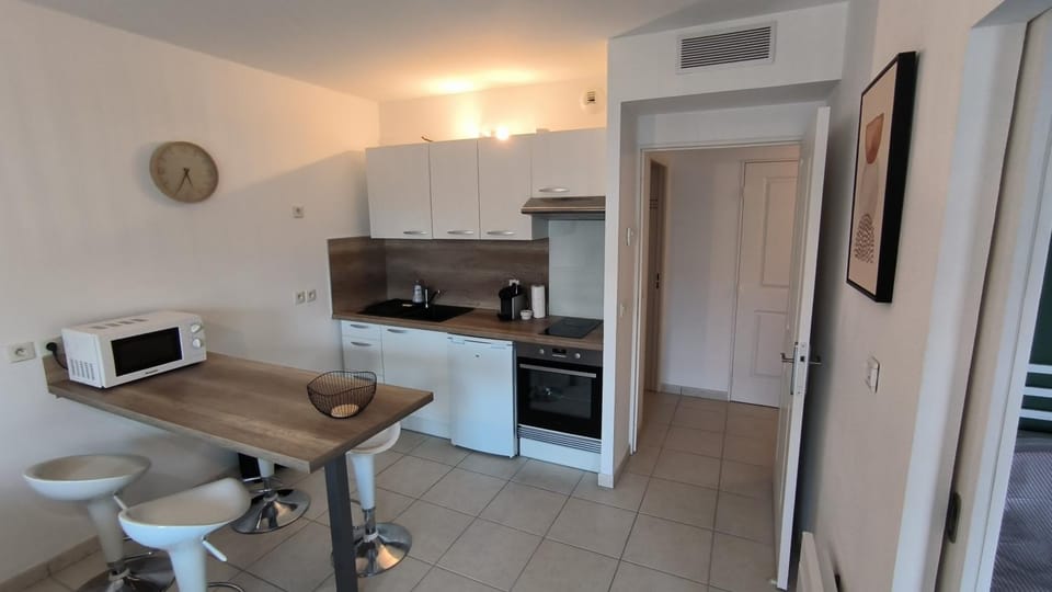 Dining area, microwave, oven, kitchen