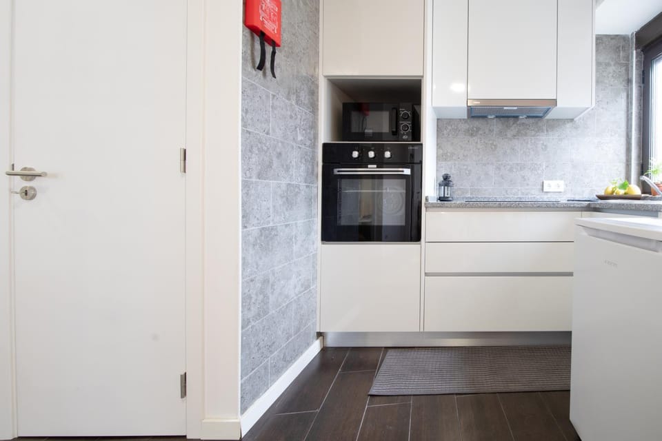 Kitchen or kitchenette, microwave, oven