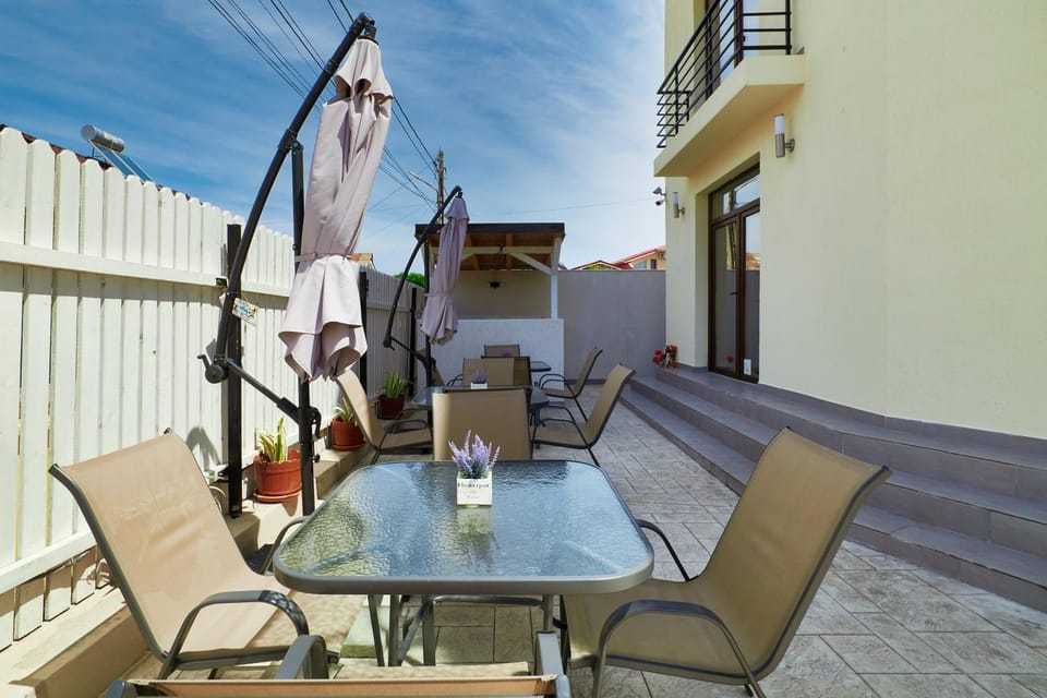Property building, Patio, Balcony/Terrace, Seating area