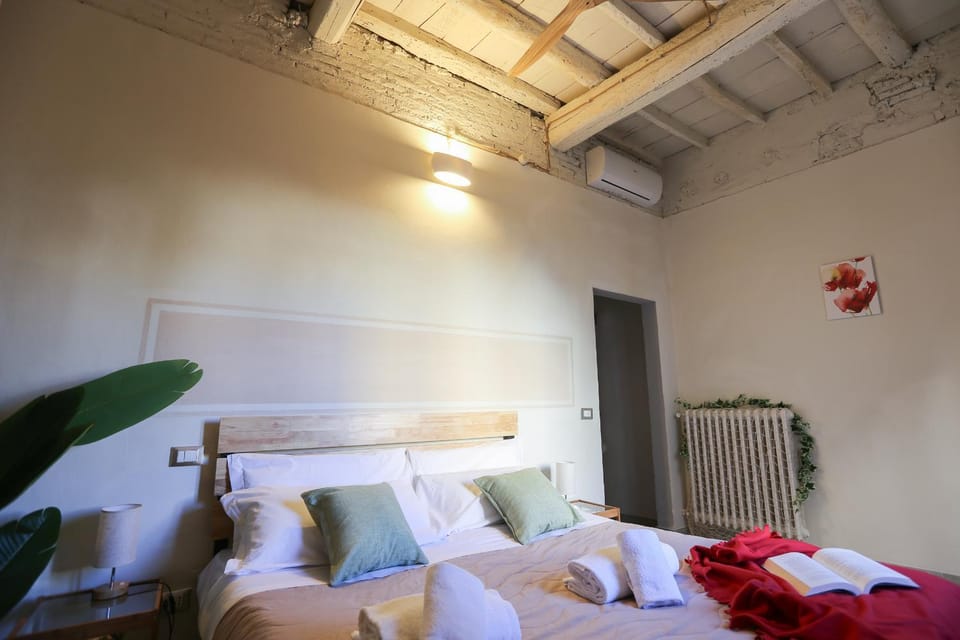 Bed, Photo of the whole room, Bedroom, towels, air conditioner