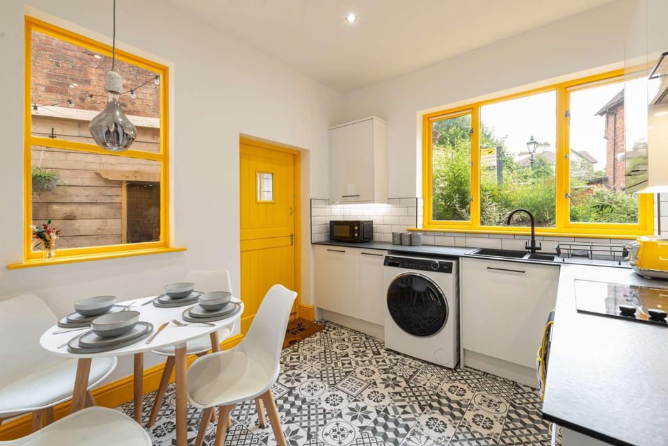 Kitchen or kitchenette, Dining area, dishwasher, oven, stove, washing machine