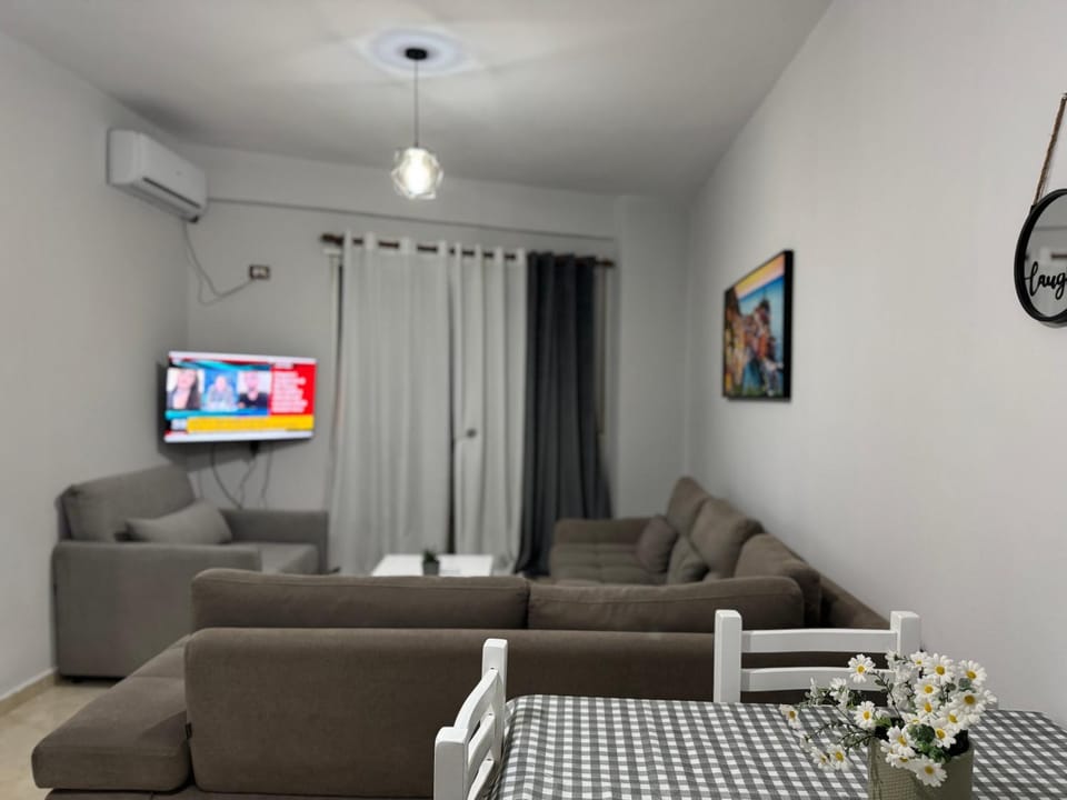 Communal lounge/ TV room, Living room, Seating area, air conditioner