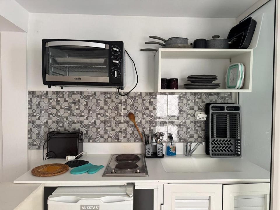 Kitchen or kitchenette, oven