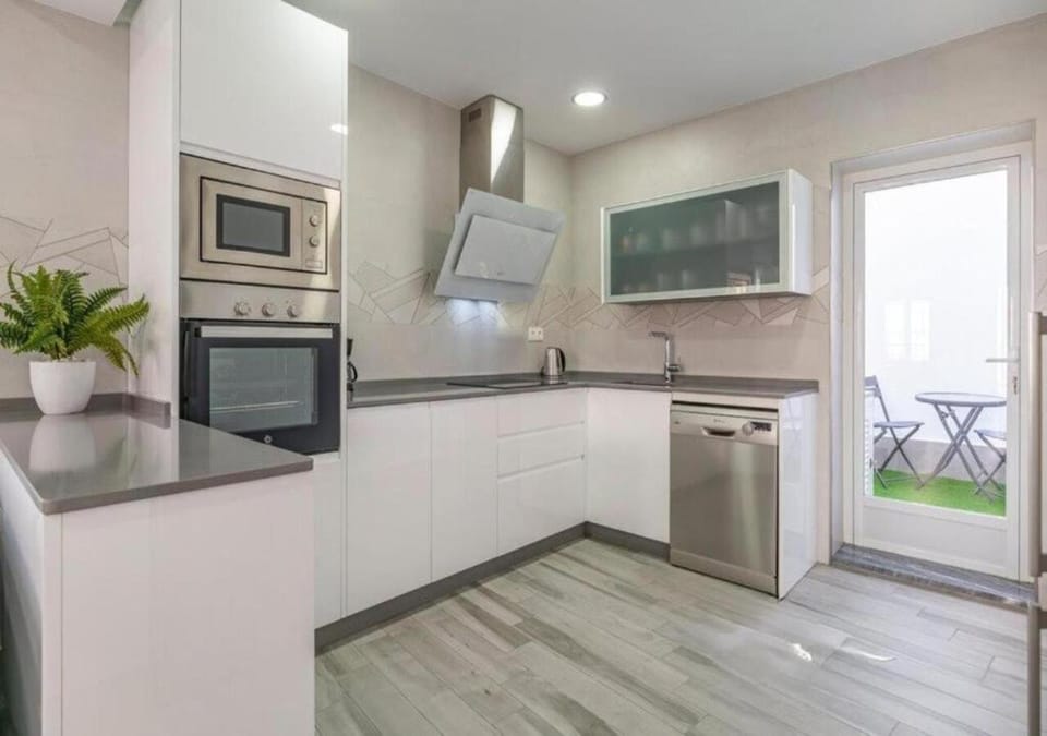 Kitchen or kitchenette, dishwasher, microwave, oven, stove, kitchen