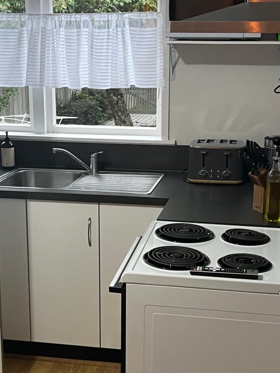 Kitchen or kitchenette, stove