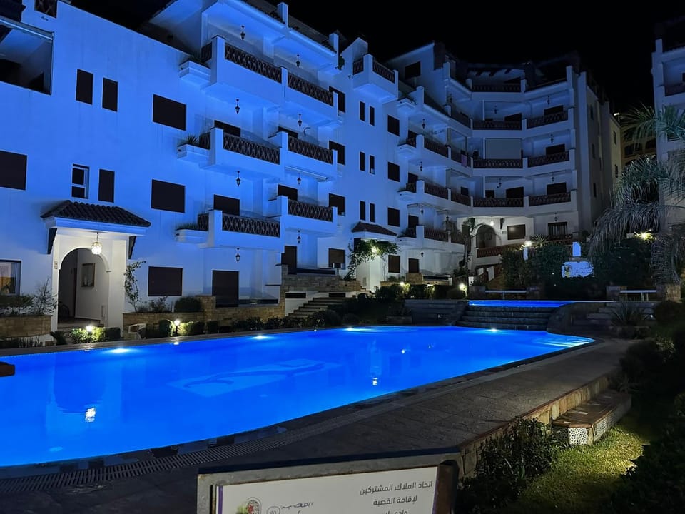 Property building, Night, Swimming pool