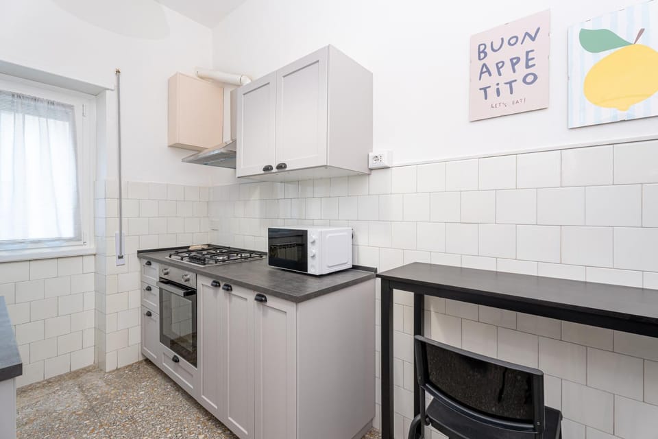 Photo of the whole room, microwave, kitchen