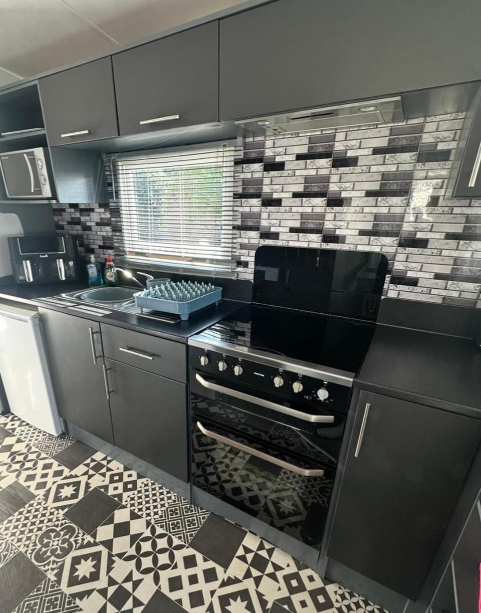 Kitchen or kitchenette, oven, stove