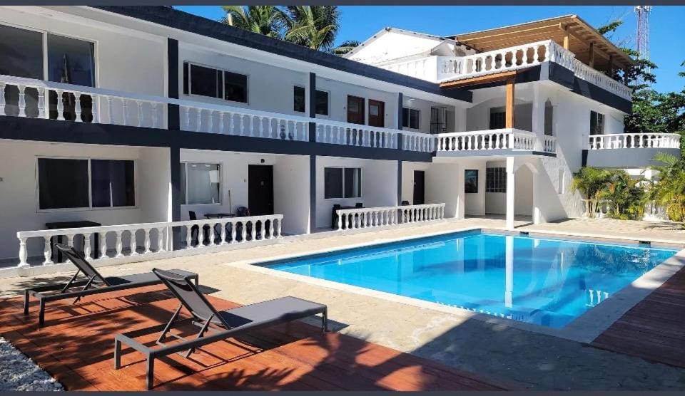 Property building, Patio, Day, View (from property/room), Pool view, Swimming pool, sunbed