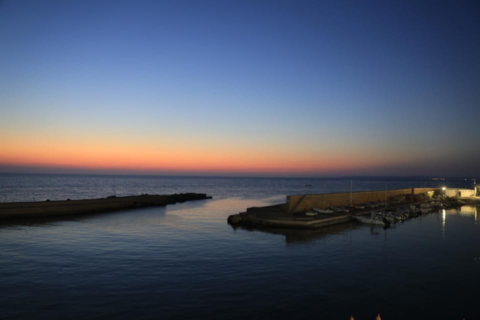Property building, Nearby landmark, Natural landscape, Sunset