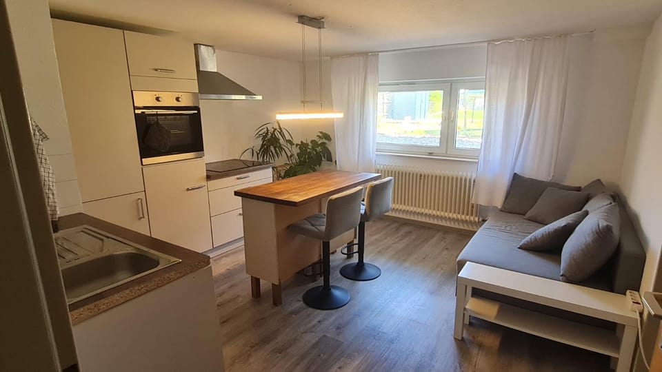 Kitchen or kitchenette, Living room, Dining area, minibar, oven, stove