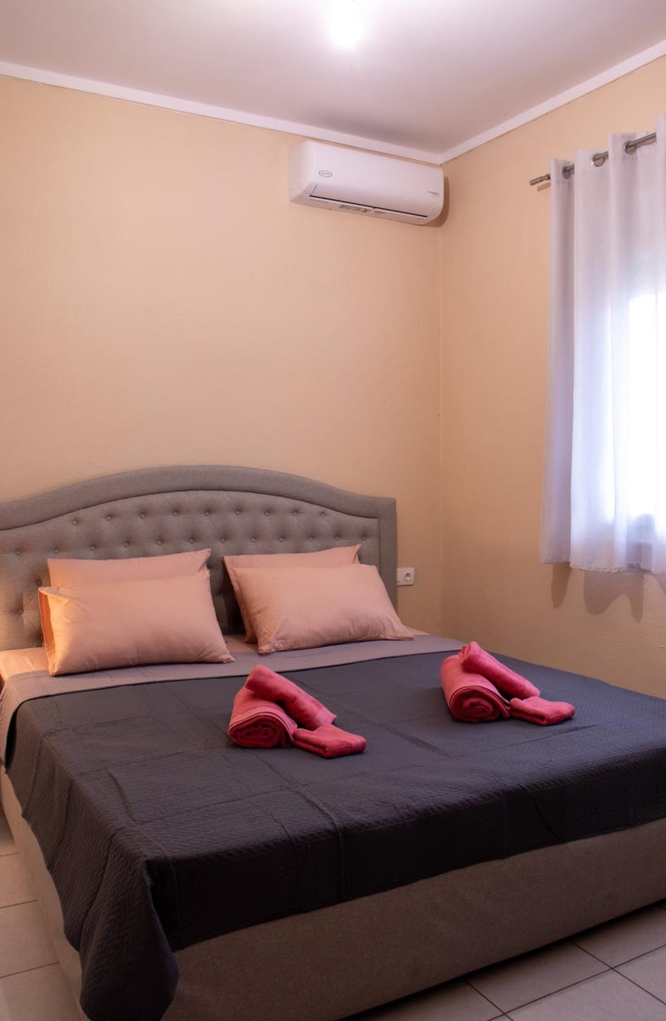 Bed, Photo of the whole room, Bedroom, towels, air conditioner