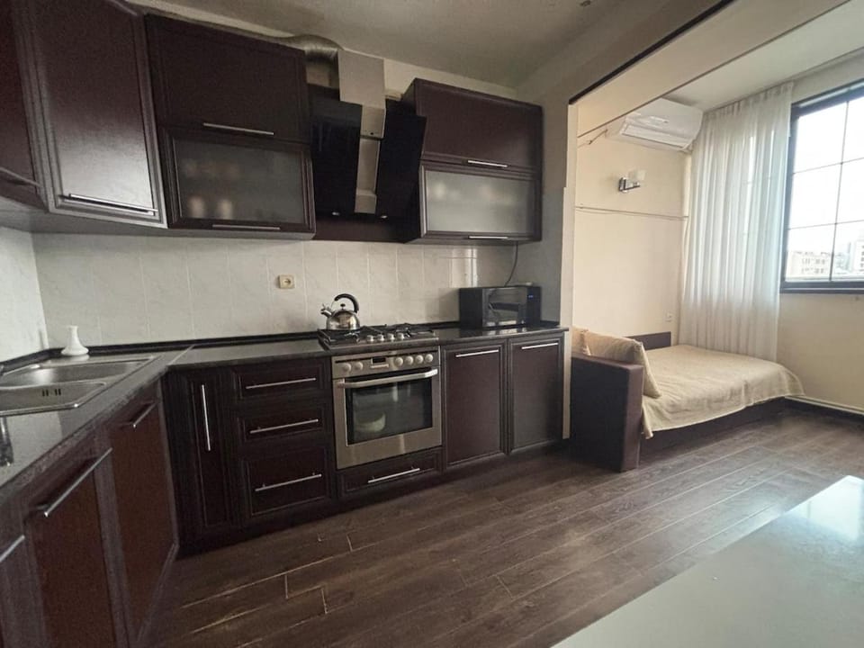 Kitchen or kitchenette, oven, stove