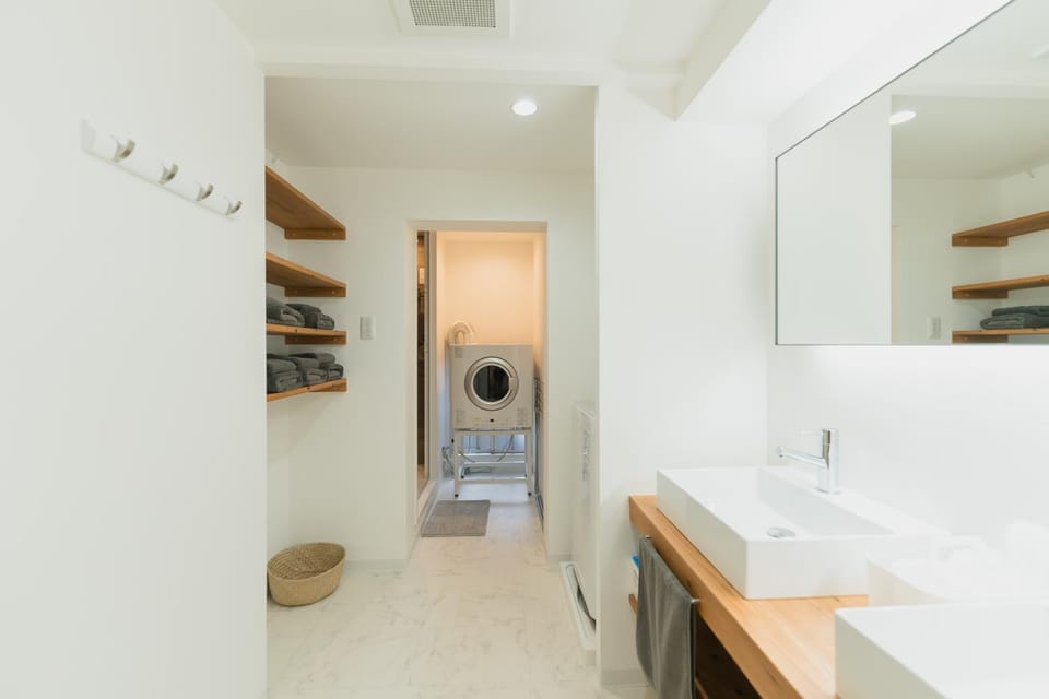 Bathroom, towels, washing machine, dryer