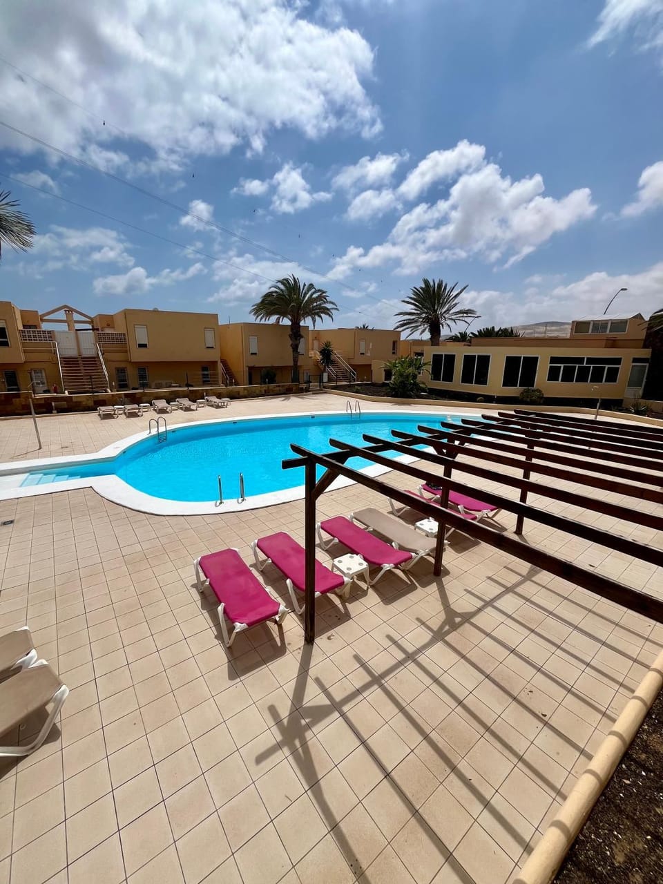 Swimming pool, sunbed