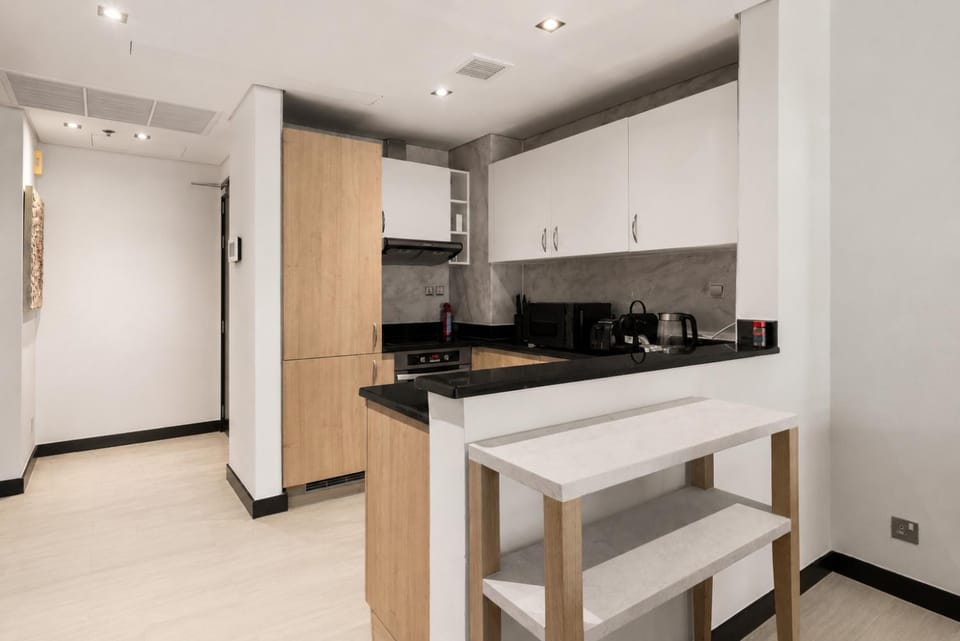 Kitchen or kitchenette, oven, stove