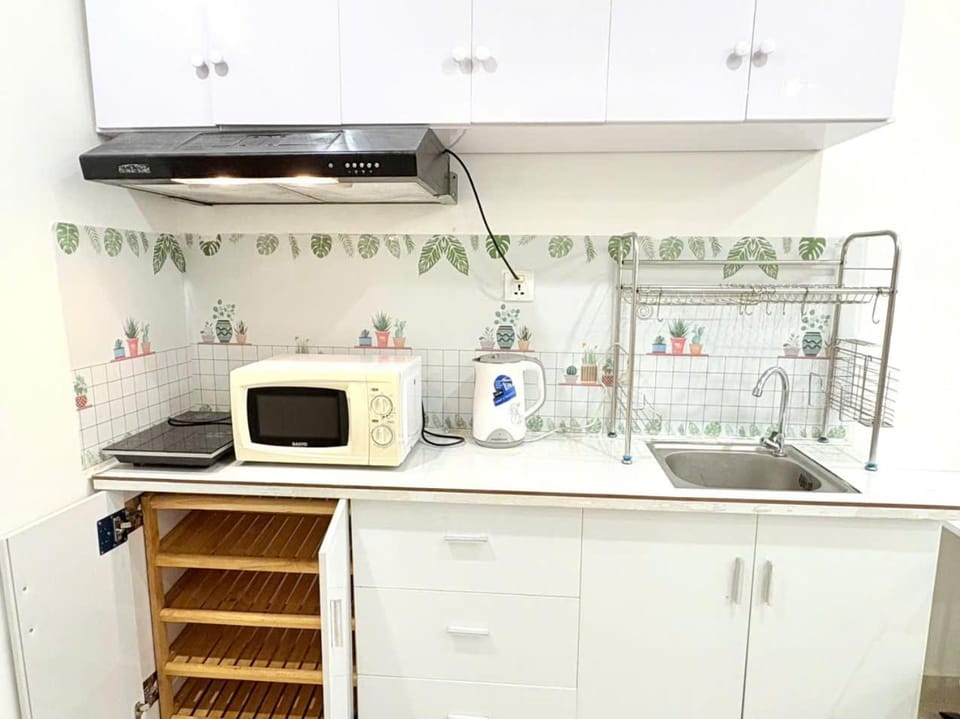 Kitchen or kitchenette, dishwasher, minibar, oven, stove, toaster