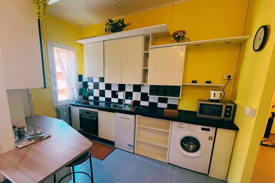 Dining area, microwave, oven, stove, washing machine