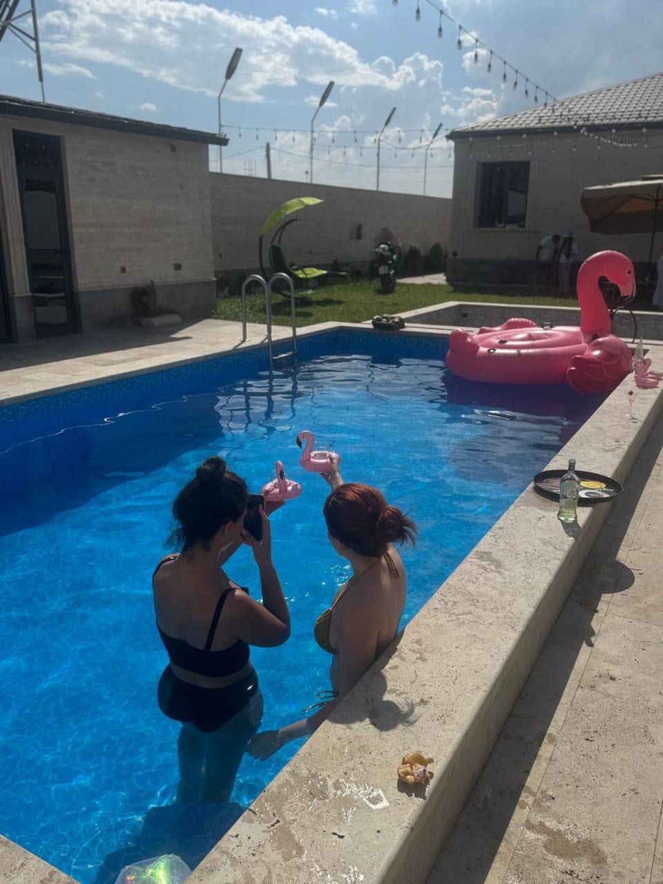 Pool view, Swimming pool, group of guests, sunbed